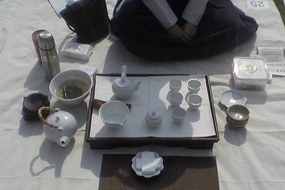 Laying out the Tea Ware